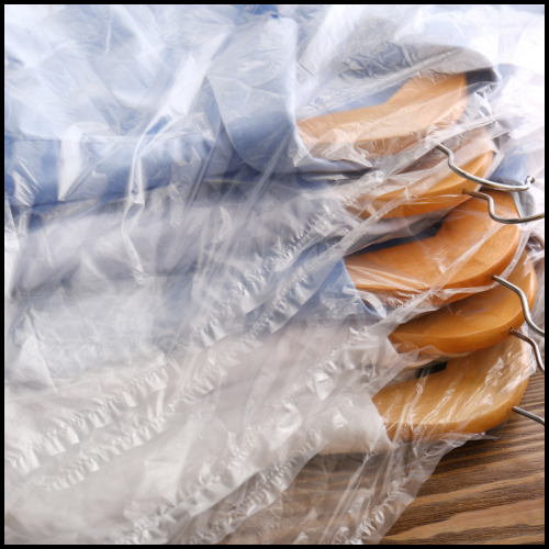 Fresh pressed work shirts in dry cleaner bags 